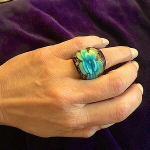 Galéries Lafayette  glass ring w/ aqua blue flower & bronze glitter base.